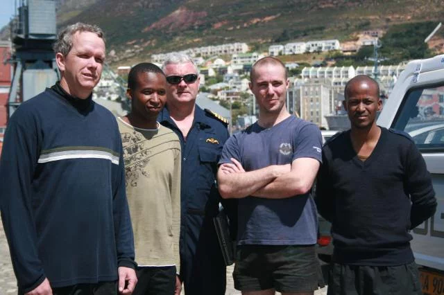 4 des sous-mariniers ayant participé à l'exercice et le Capt De Wet